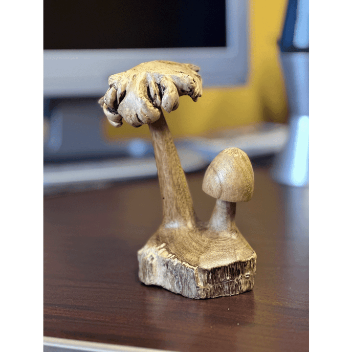 Double Mushroom Wooden Statue at desk
